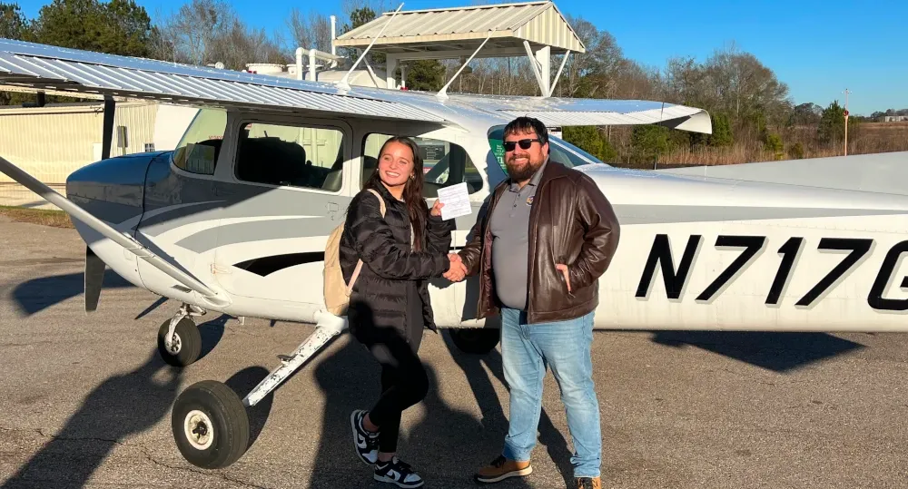 Student receiving instruction pre-flight