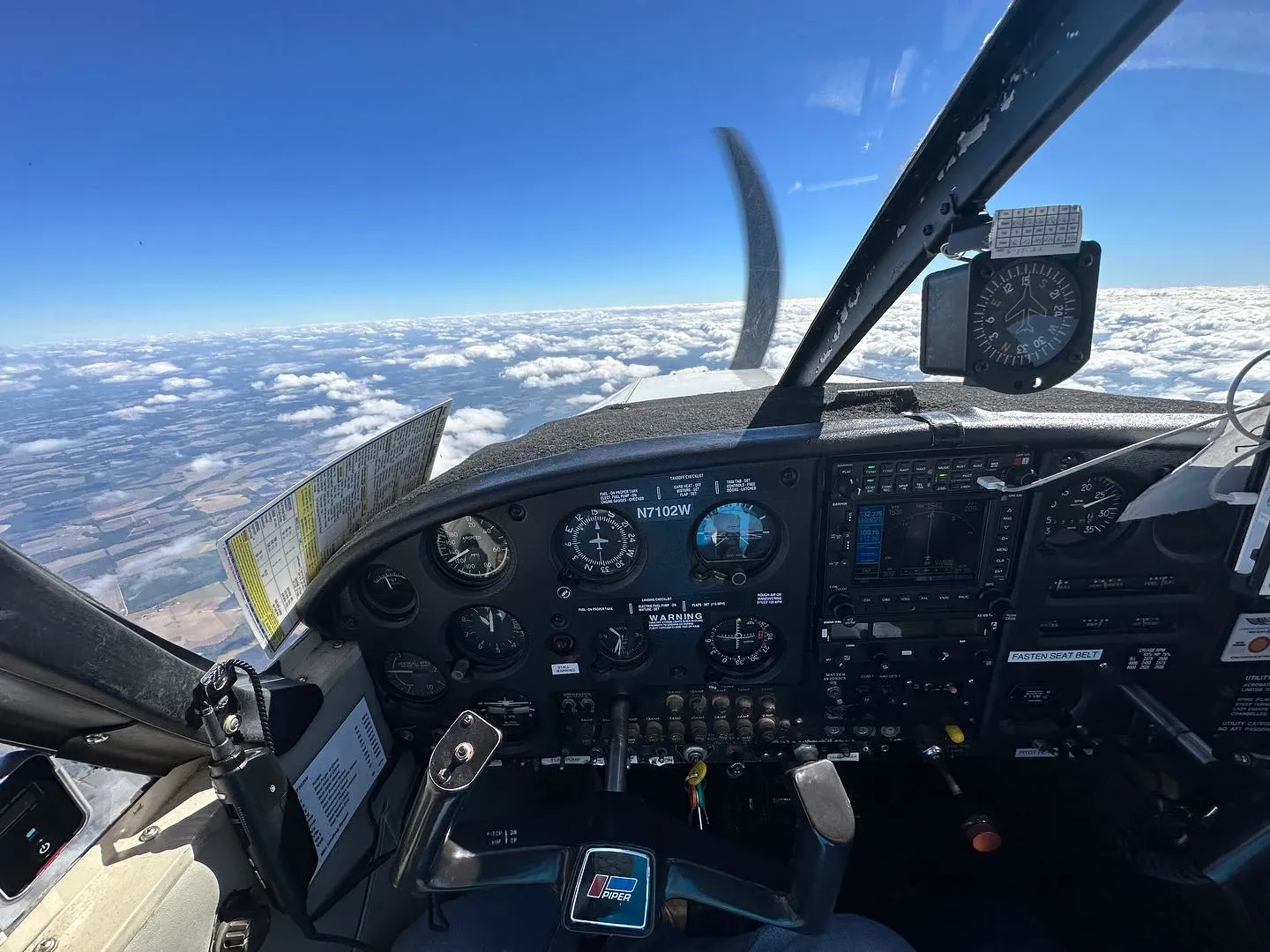 Flight instructors with students near aircraft