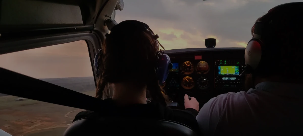 Student pilot flying a Cessna with an instructor